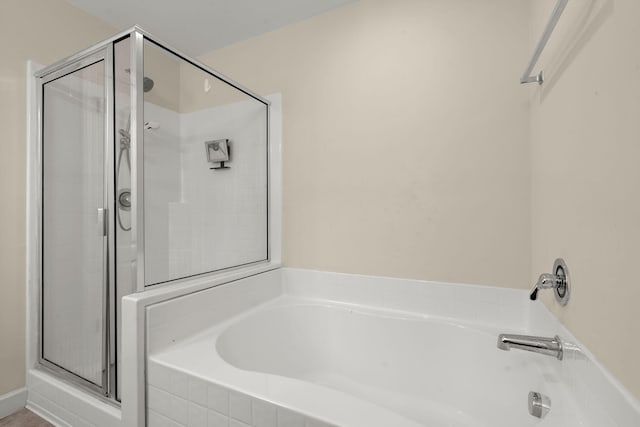 bathroom with independent shower and bath