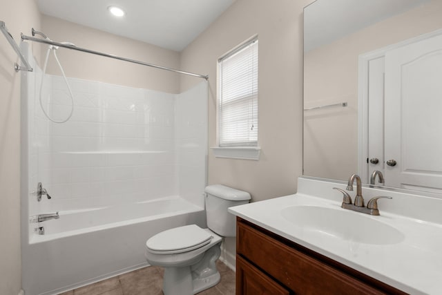 full bathroom with tile patterned flooring, vanity, bathtub / shower combination, and toilet