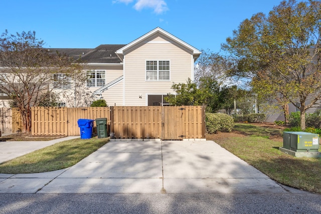 view of property exterior with a yard