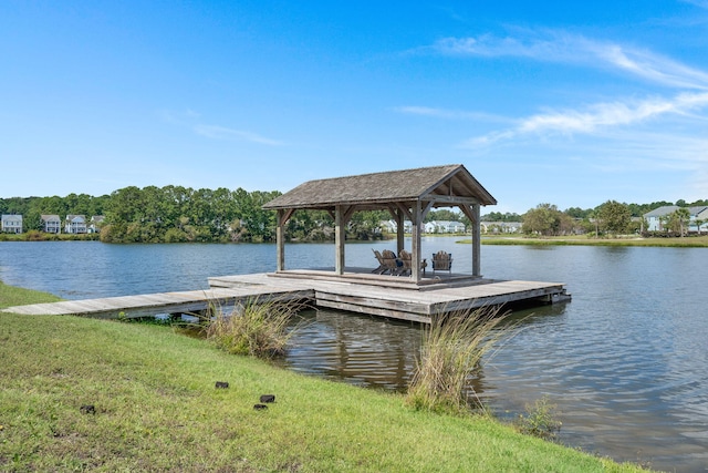 dock area featuring a gazebo and a water view