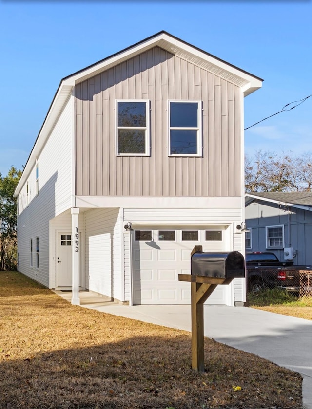 view of front of property featuring a garage