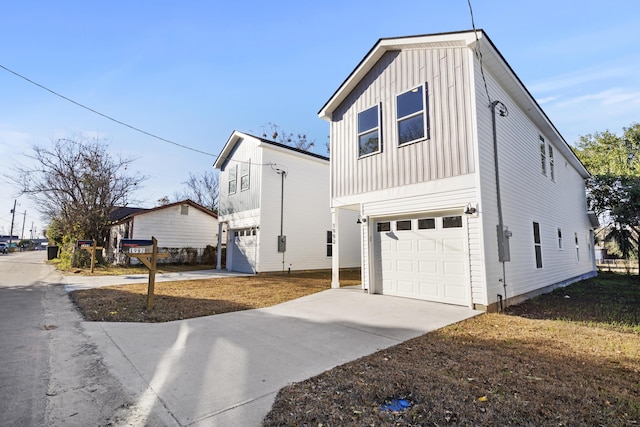 view of side of home with a garage