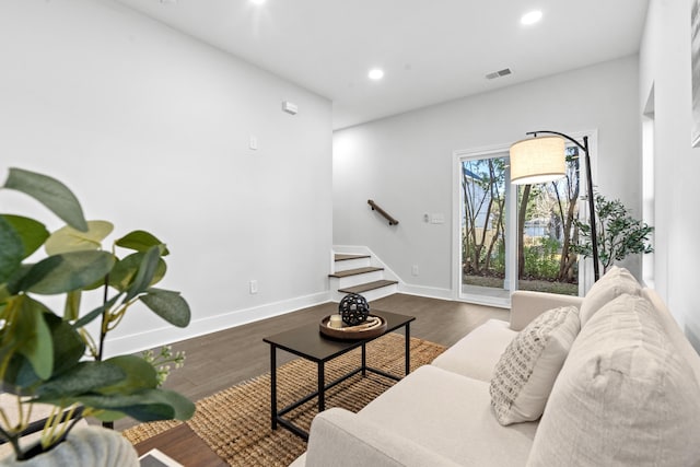 living room featuring dark hardwood / wood-style flooring