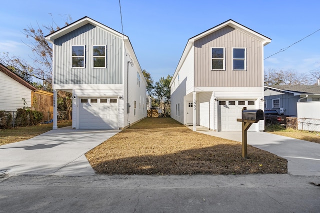 front of property with a garage