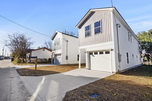 view of property exterior with a garage