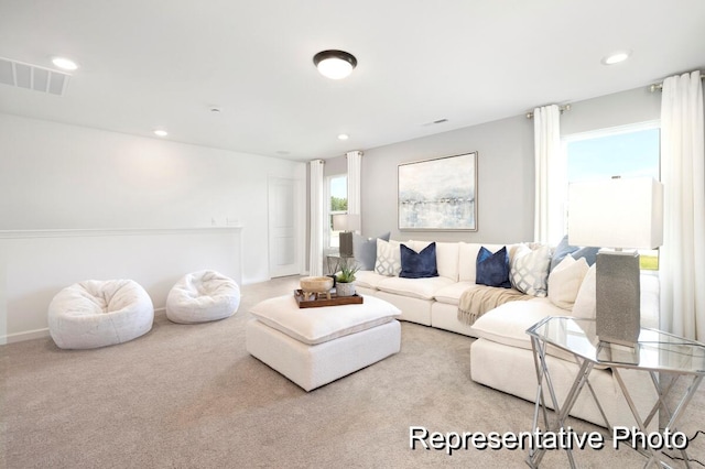 185 Surf Bird Rd Unit 506P, Summerville, SC 29486 - carpeted living room featuring baseboards, visible vents, and recessed lighting