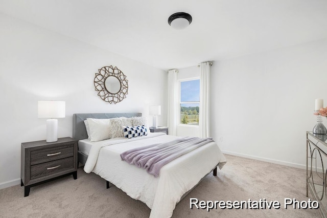 185 Surf Bird Rd Unit 506P, Summerville, SC 29486 - bedroom with baseboards and light colored carpet