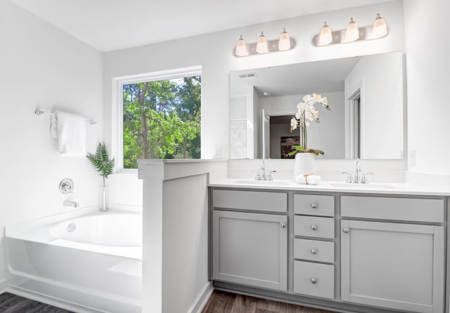 185 Surf Bird Rd Unit 506P, Summerville, SC 29486 - bathroom with a garden tub, a sink, visible vents, and double vanity