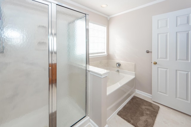 bathroom featuring tile patterned floors, ornamental molding, and separate shower and tub