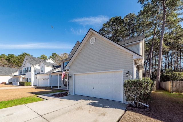 view of property exterior with a garage