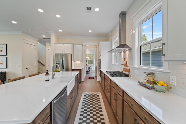 4235 Royal Harbor Rd, Hollywood, SC 29449 - kitchen with appliances with stainless steel finishes, a kitchen island with sink, exhaust hood, and plenty of natural light