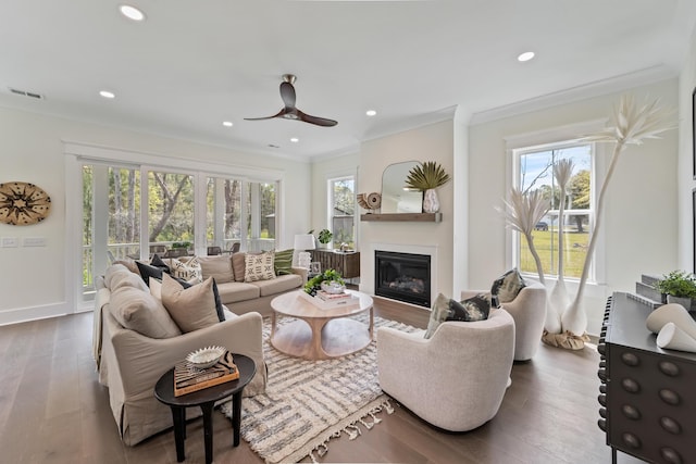 4235 Royal Harbor Rd, Hollywood, SC 29449 - living area featuring hardwood / wood-style floors, ceiling fan, crown molding, and visible vents