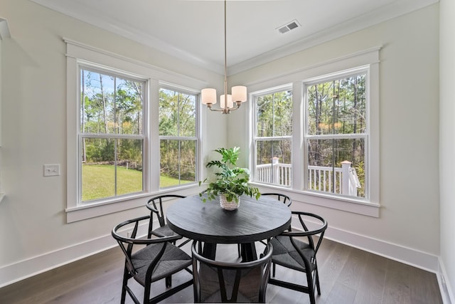 4235 Royal Harbor Rd, Hollywood, SC 29449 - dining room featuring plenty of natural light, a notable chandelier, dark wood-type flooring, and visible vents