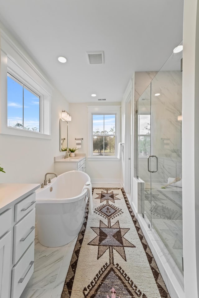 4235 Royal Harbor Rd, Hollywood, SC 29449 - full bath with a soaking tub, vanity, recessed lighting, marble finish floor, and a marble finish shower