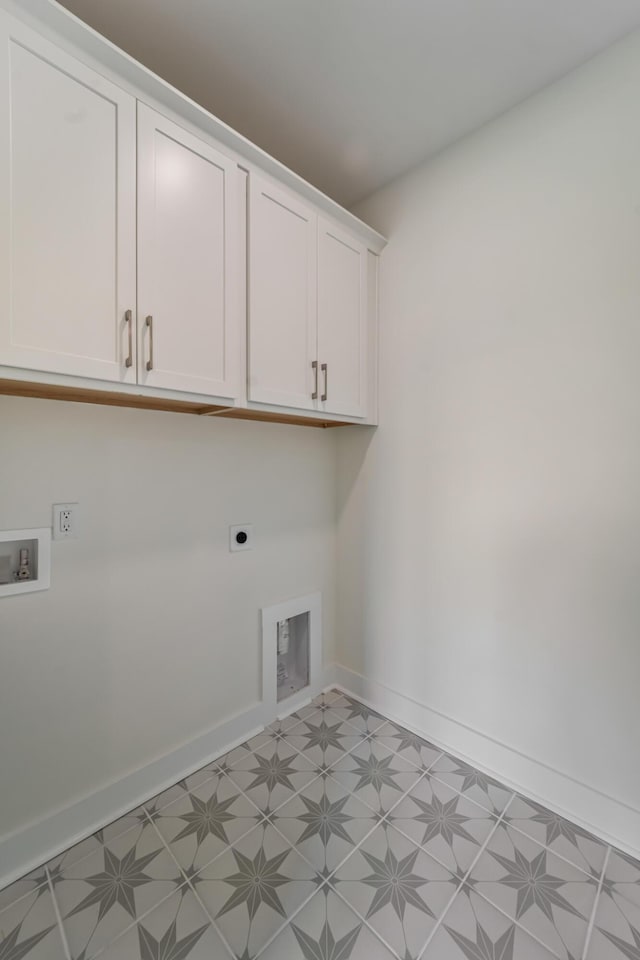 4235 Royal Harbor Rd, Hollywood, SC 29449 - laundry area with hookup for an electric dryer, baseboards, washer hookup, cabinet space, and light floors