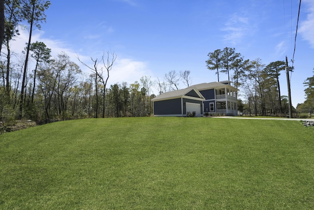 4235 Royal Harbor Rd, Hollywood, SC 29449 - view of yard featuring a garage