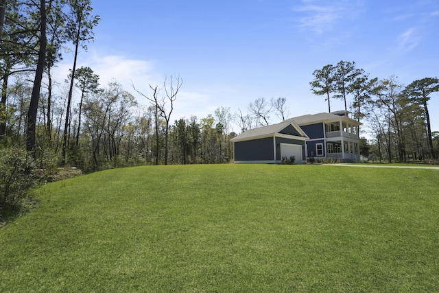 4235 Royal Harbor Rd, Hollywood, SC 29449 - view of yard with an attached garage