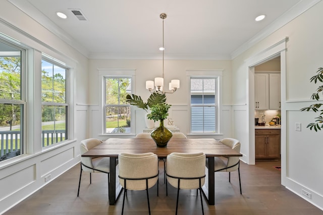 4235 Royal Harbor Rd, Hollywood, SC 29449 - dining space featuring a decorative wall, visible vents, a notable chandelier, and dark wood finished floors