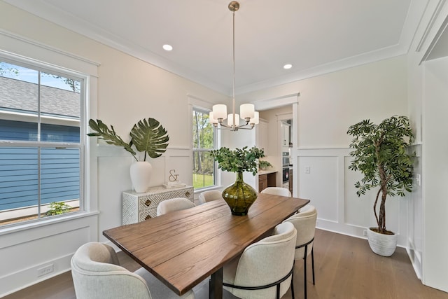 4235 Royal Harbor Rd, Hollywood, SC 29449 - dining room with an inviting chandelier, ornamental molding, wainscoting, dark wood finished floors, and a decorative wall