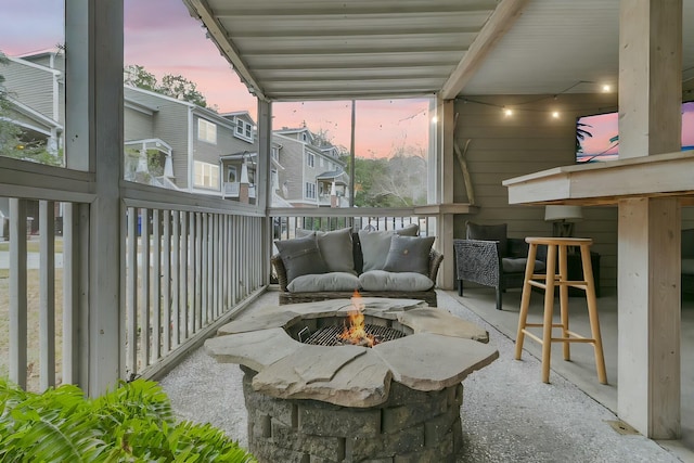 exterior space with a fire pit