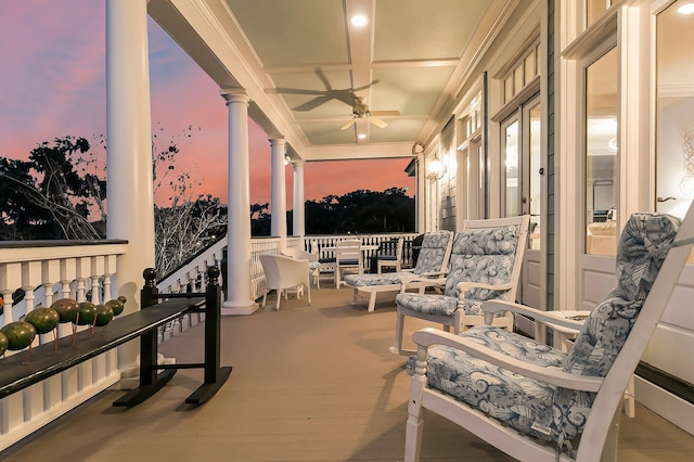 exterior space with a balcony and ceiling fan