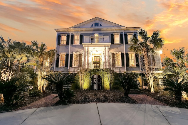 view of front of home with a balcony