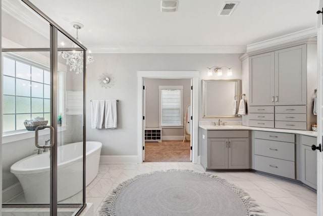 525 Yellow Tower Ter, Charleston, SC 29412 - bathroom featuring marble look tile flooring, vanity, a chandelier, a soaking tub, and crown molding