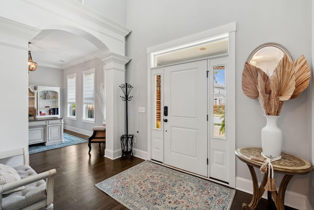 525 Yellow Tower Ter, Charleston, SC 29412 - foyer entrance with arched walkways, ornate columns, dark wood-type flooring, and ornamental molding