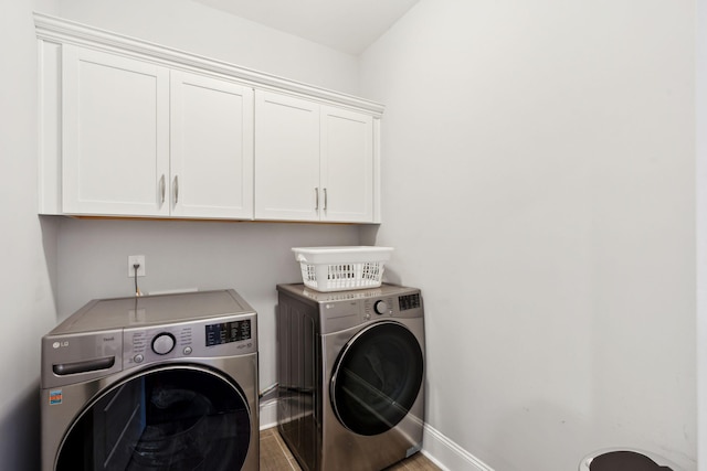 525 Yellow Tower Ter, Charleston, SC 29412 - laundry room featuring separate washer and dryer, cabinet space, and wood finished floors