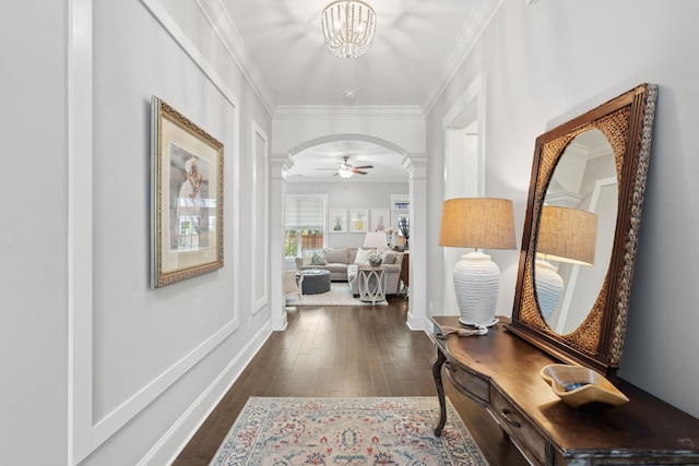 525 Yellow Tower Ter, Charleston, SC 29412 - hallway featuring dark wood-style flooring, ornamental molding, arched walkways, decorative columns, and a chandelier