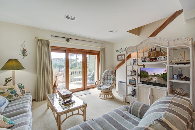 carpeted living area with visible vents