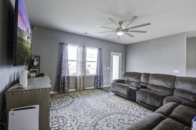 living room featuring ceiling fan