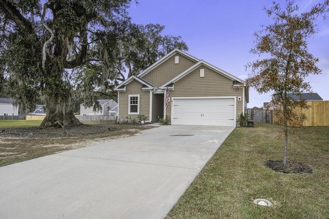 view of front facade featuring a garage and a front yard