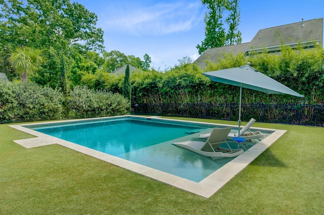 2557 Hatch Dr, Johns Island, SC 29455 - view of swimming pool featuring fence, a fenced in pool, and a lawn