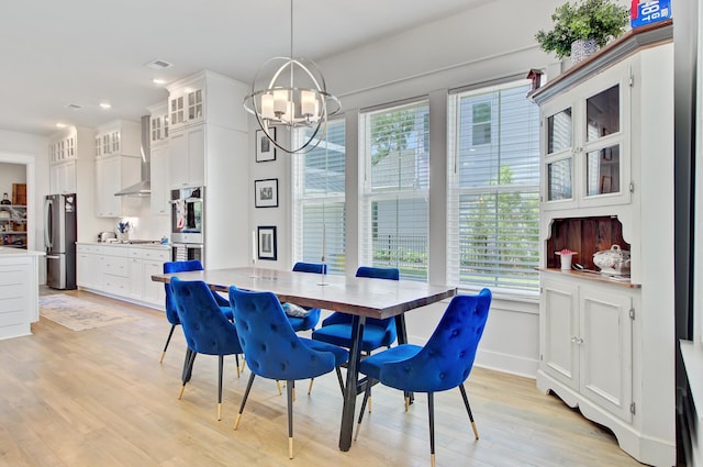 2557 Hatch Dr, Johns Island, SC 29455 - dining room with an inviting chandelier, recessed lighting, and light wood-style flooring
