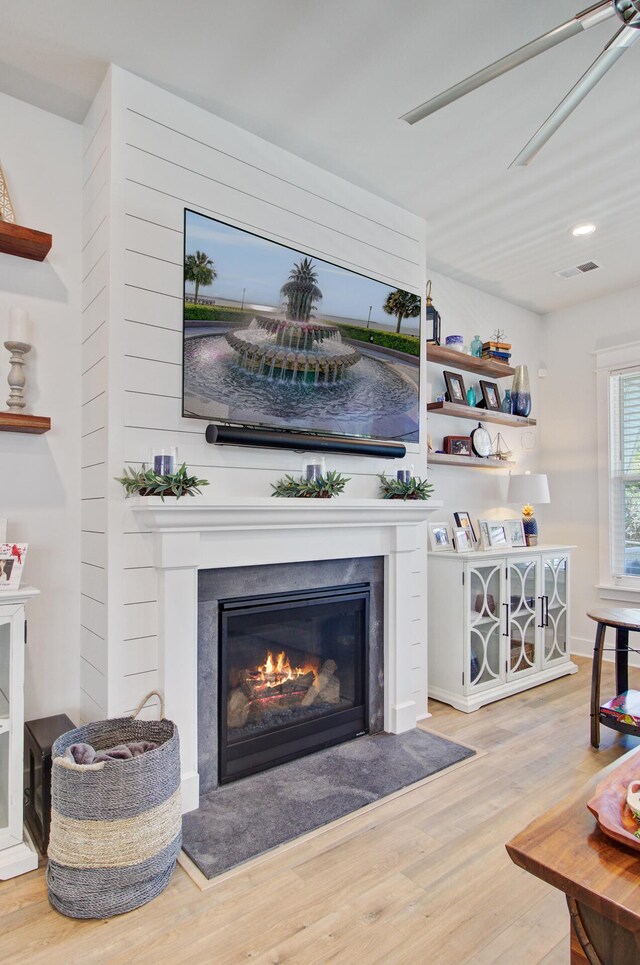 2557 Hatch Dr, Johns Island, SC 29455 - living area with visible vents, a high end fireplace, wood finished floors, and recessed lighting