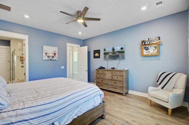 2557 Hatch Dr, Johns Island, SC 29455 - bedroom with visible vents, connected bathroom, light wood-style flooring, and baseboards