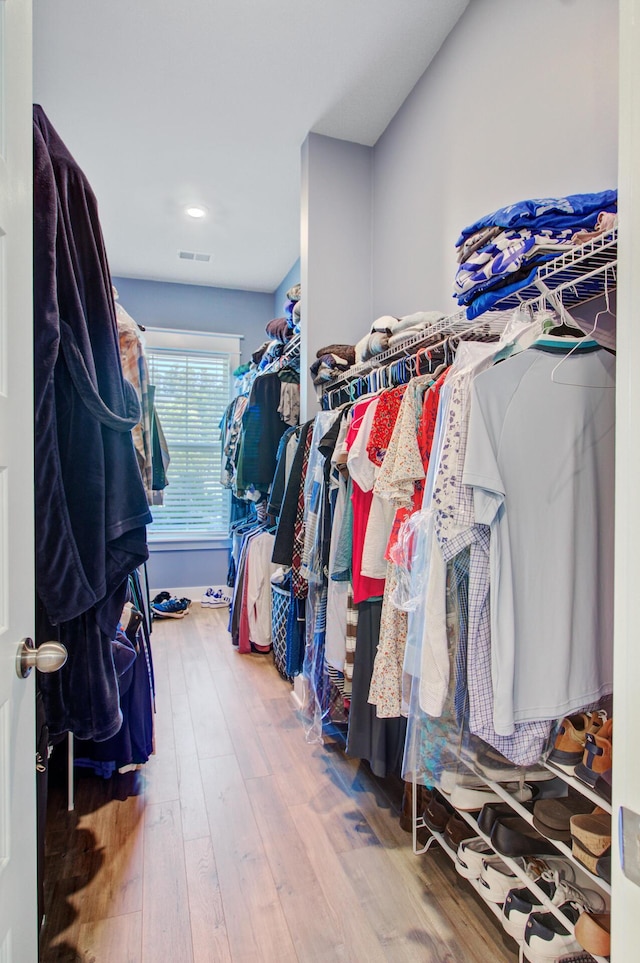 2557 Hatch Dr, Johns Island, SC 29455 - spacious closet featuring visible vents and wood finished floors