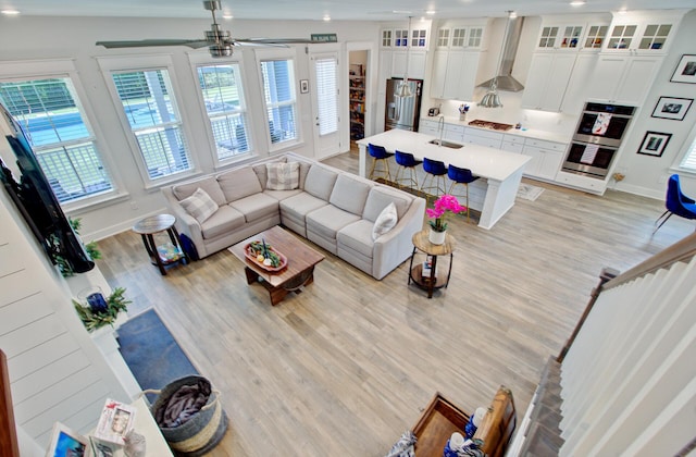 2557 Hatch Dr, Johns Island, SC 29455 - living area with baseboards, a ceiling fan, and light wood-style flooring