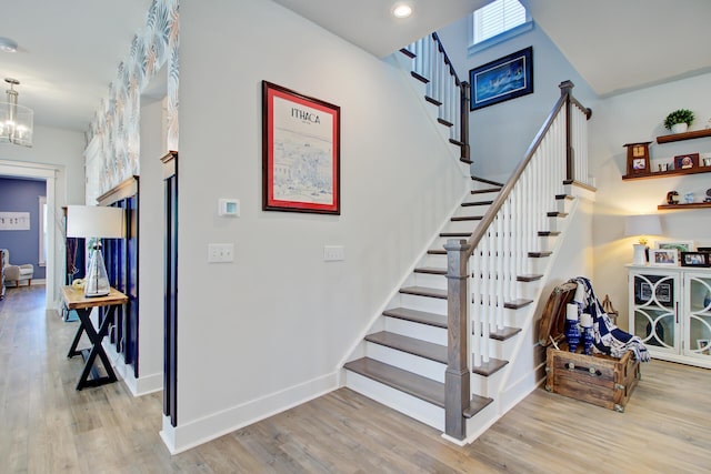 2557 Hatch Dr, Johns Island, SC 29455 - stairs with baseboards, recessed lighting, wood finished floors, and an inviting chandelier
