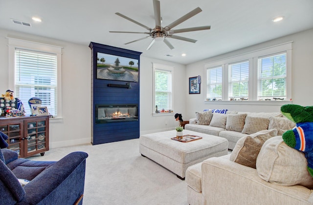 2557 Hatch Dr, Johns Island, SC 29455 - carpeted living room featuring ceiling fan, a fireplace, recessed lighting, baseboards, and visible vents