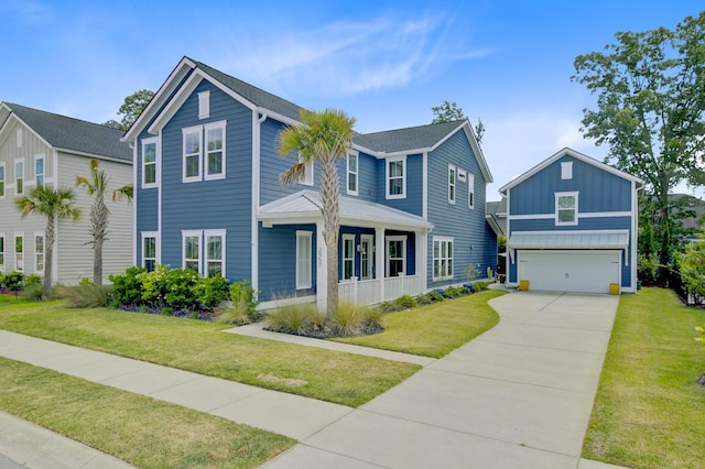 2557 Hatch Dr, Johns Island, SC 29455 - view of front of home with a garage, a front lawn, board and batten siding, and driveway