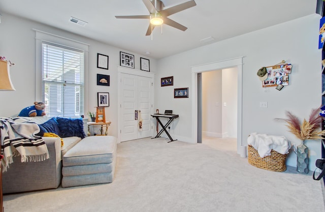 2557 Hatch Dr, Johns Island, SC 29455 - living area featuring visible vents, a ceiling fan, baseboards, and carpet flooring