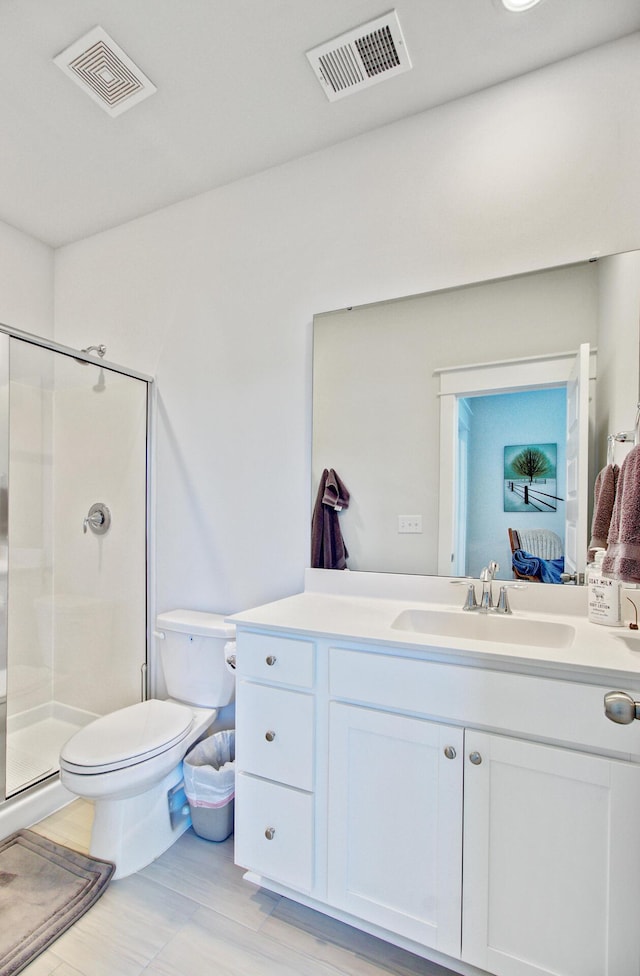2557 Hatch Dr, Johns Island, SC 29455 - ensuite bathroom featuring vanity, a stall shower, toilet, and visible vents