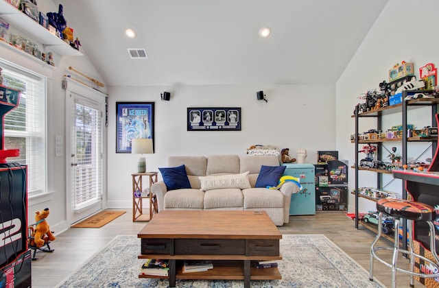 2557 Hatch Dr, Johns Island, SC 29455 - living area with recessed lighting, visible vents, wood finished floors, and lofted ceiling
