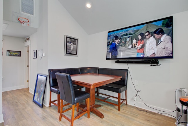 2557 Hatch Dr, Johns Island, SC 29455 - dining area featuring visible vents, light wood-style flooring, baseboards, and high vaulted ceiling