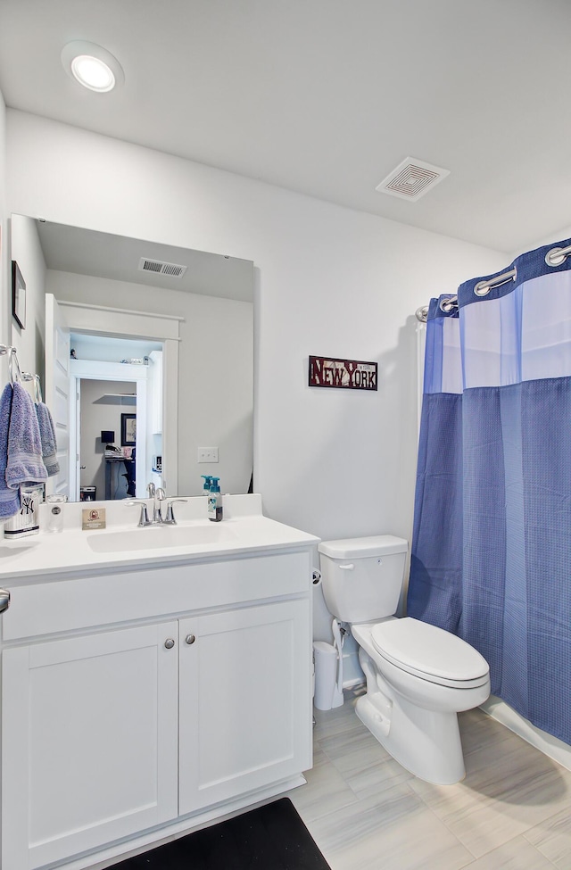 2557 Hatch Dr, Johns Island, SC 29455 - bathroom featuring toilet, visible vents, a shower with shower curtain, and vanity