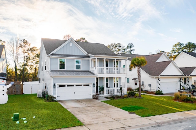 view of front of home with a garage, covered porch, a balcony, and a front lawn