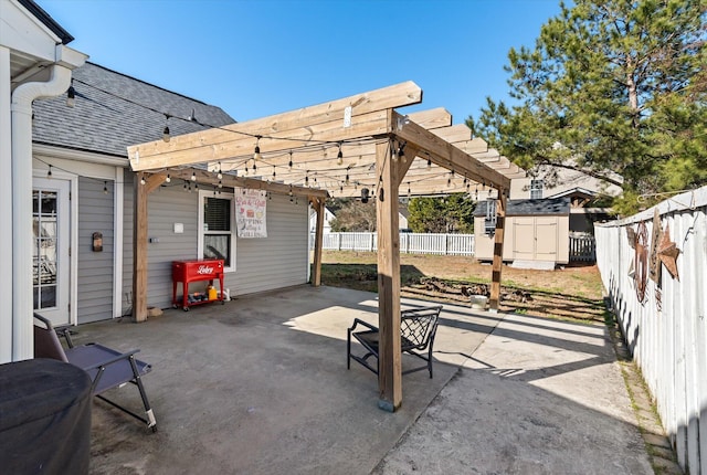 view of patio with a shed and a pergola