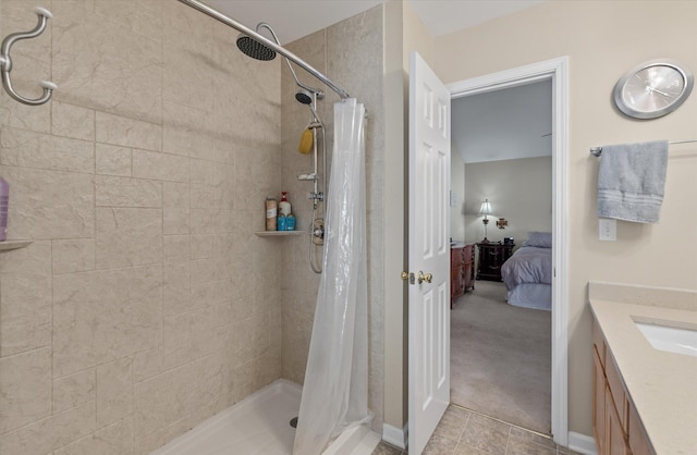 bathroom with vanity, tile patterned floors, and curtained shower